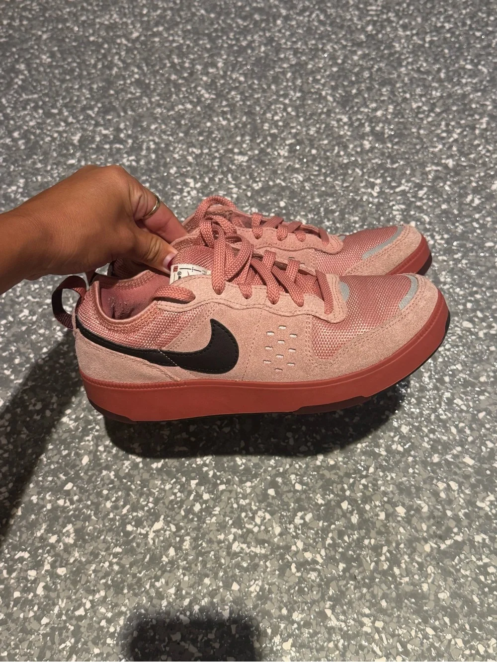 Nike Women's Rose Pink Low-Top Sneakers with Black Swoosh